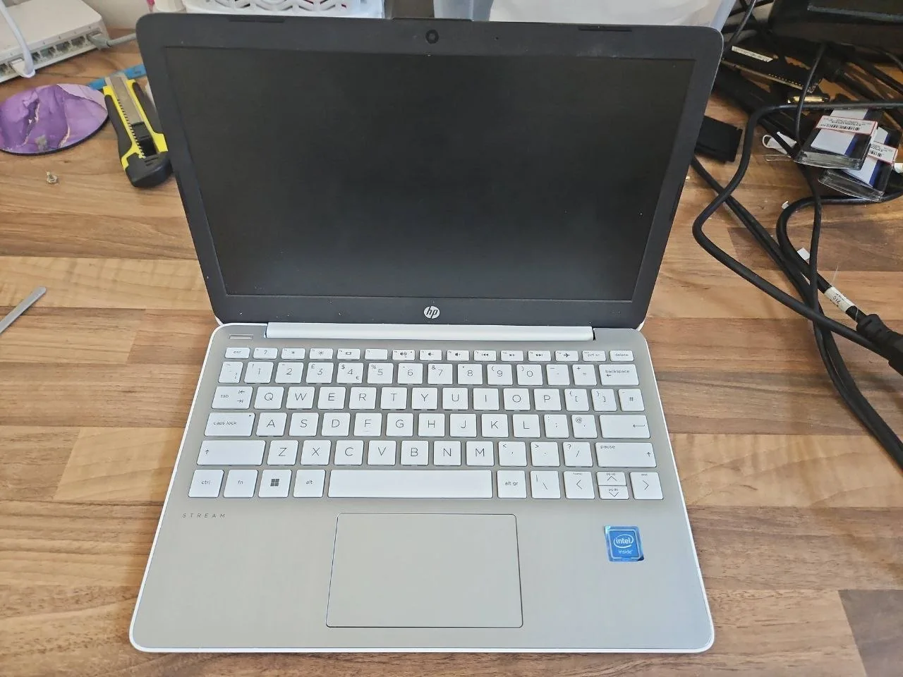 HP laptop prepared for battery diagnosis at the PC Repair Guru workshop in Birmingham