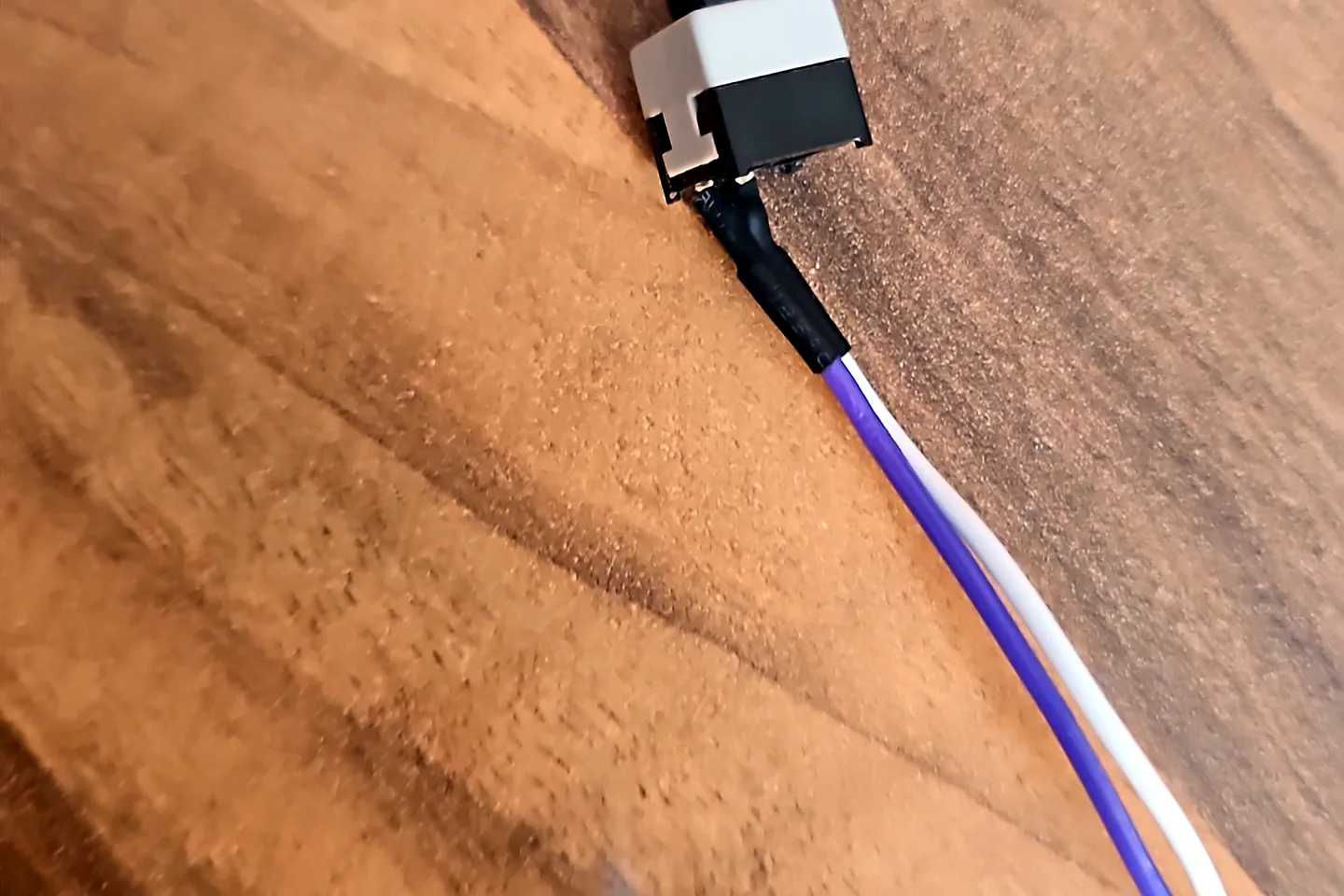 Laptop charging port and power connection being inspected in Birmingham