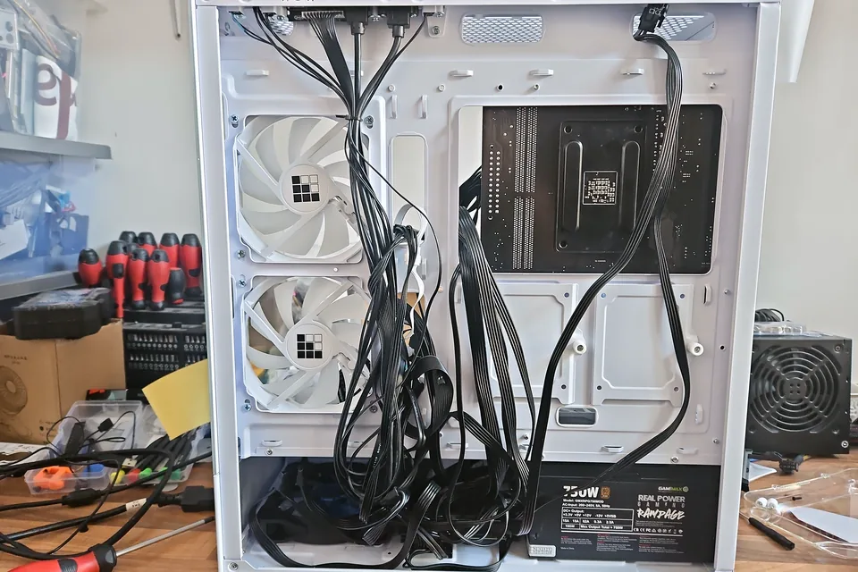 Rear cable routing inside a custom desktop PC during fault diagnosis for customers in Yardley, Birmingham